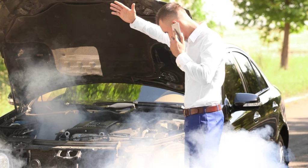 Why is My Car Smoking Under the Hood Common Causes Fixes