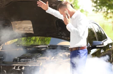 Why is My Car Smoking Under the Hood Common Causes Fixes